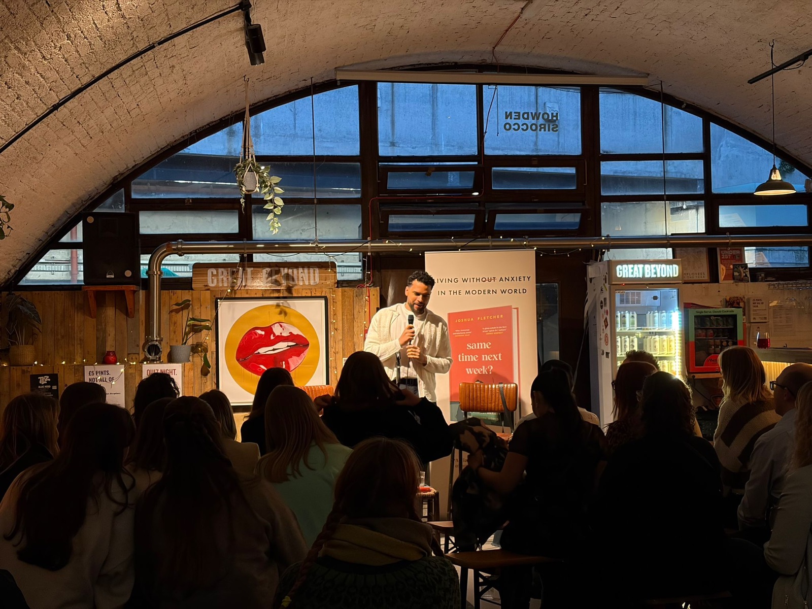 Peter Ruppert addressing a room at a speaking event